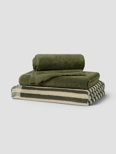Stack of Olive Green Pembroke Stripe and Fringe Edge Towels