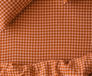 Drap-housse en mélange de lin vichy couleur cannelle et pêche
