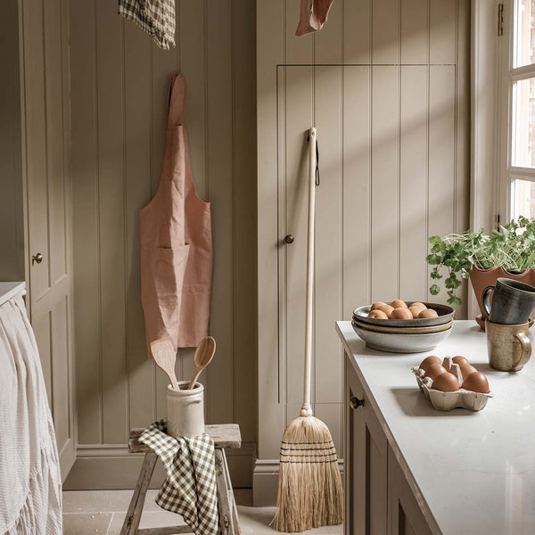 Warm Clay Linen Apron, Botanical Green Gingham Tea Towels, Pottery West Mugs and Dinner Bowls