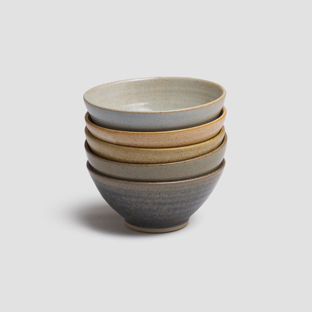 Pottery West Cereal Bowls in Powder, Sand, Ochre, Olive, and Nori