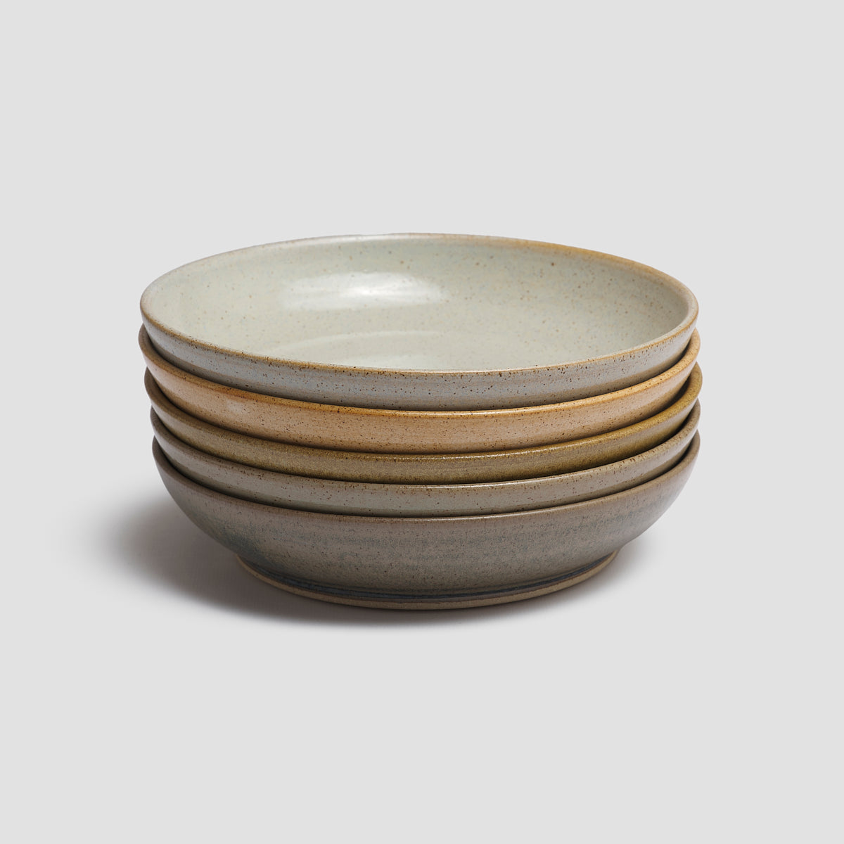 Pottery West Dinner Bowls in Powder, Sand, Ochre, Olive, and Nori